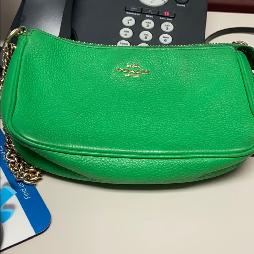 Green leather Coach wristlet. Gently used